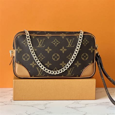 louis vuitton dragonne clutch|authentic louis vuitton clutch.